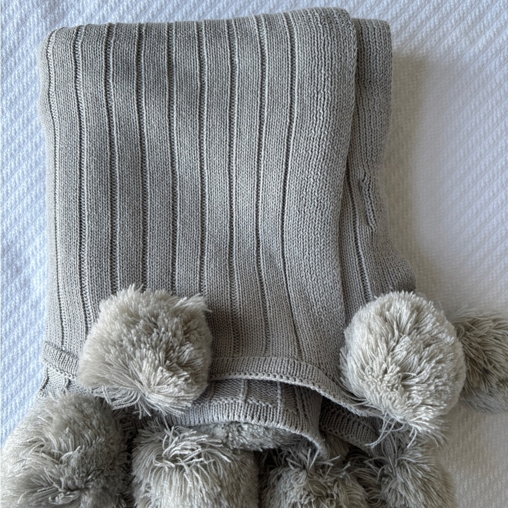 Cozy Gray Knit Pom-Pom stroller blanket for baby